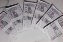 离婚协议书约定精神赔偿金五十万元，经审查因不符合相关法律规定被驳回