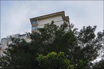 共同出资购买房屋登记在未成年子女名下，离婚时应当按夫妻共同财产予以分割处理